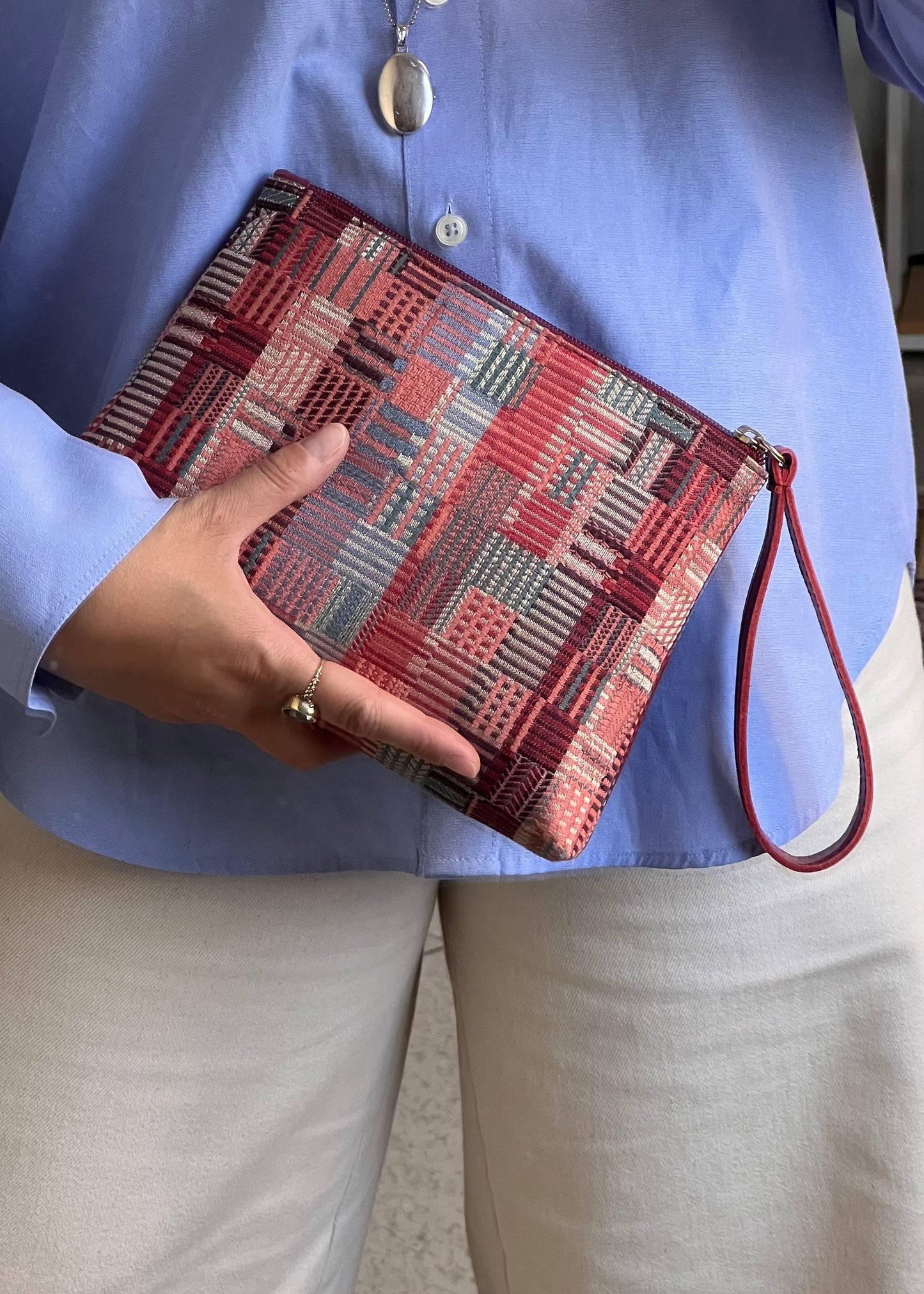 pochette tessuto e pelle